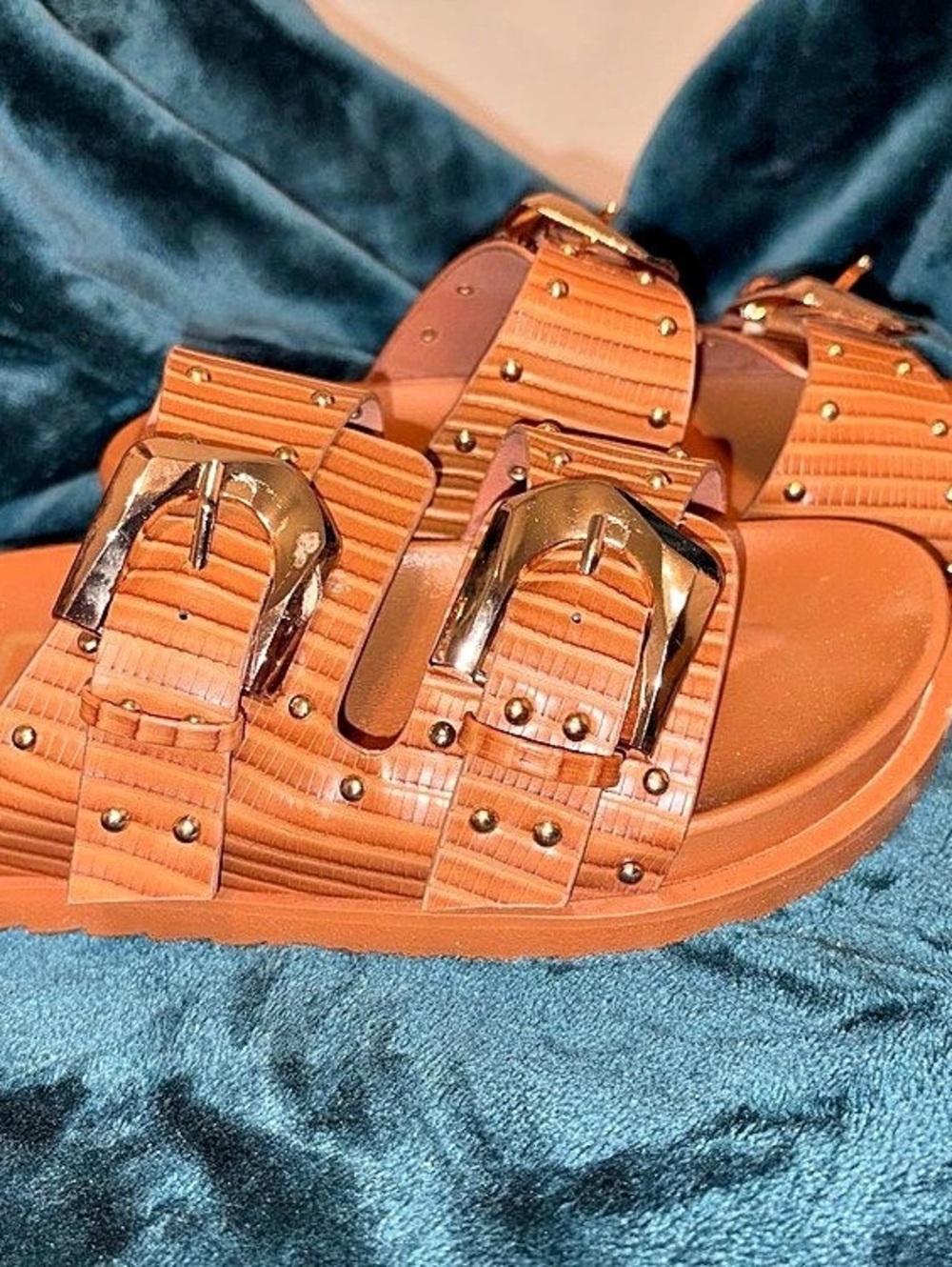 NRS slides brown with gold accents